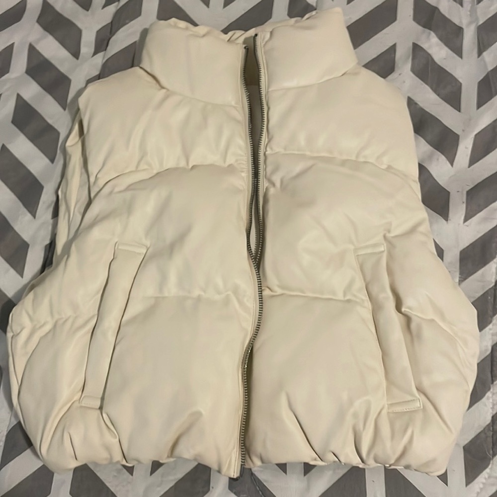 a vest from Dry Goods its a small and it’s a cream color